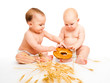Boys eating bread roll