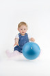 Dinky little girl with ball