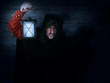 Night watchman with a lantern