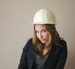 Photo: Pretty girl with construction helmet Pretty girl with construction helmet