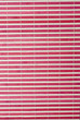 Textura de una estera de bambú roja.