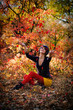 The girl in autumn wood