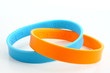 Yellow and light blue rubber bracelet.