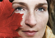 Woman behind the leaf