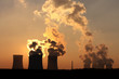 Photo en ligne au meilleur prix chimney and cooling towers of power plant during sunset