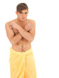 frightened young handsome man in yellow towel