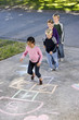 Photo: Kids playing hopscotch Kids playing hopscotch