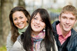 Group of smiling young students outdoors Group of smiling young students outdoors