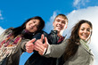 Group of smiling young students outdoors Group of smiling young students outdoors