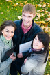 Group of smiling young students outdoors Group of smiling young students outdoors