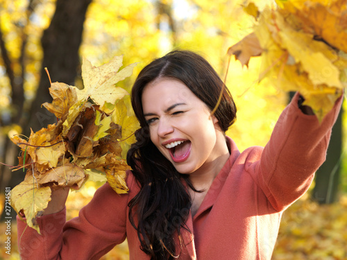 Illustration: Beautiful woman spending time in park during autumn season Beautiful woman spending time in park during autumn season