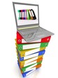 Colorful folders next to a modern laptop