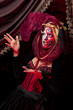 cool Venetian mask makeup over vintage interior