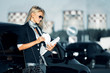 Young businesswoman with financial reports.