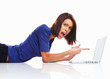 Shocked angry college girl pointing at her laptop screen