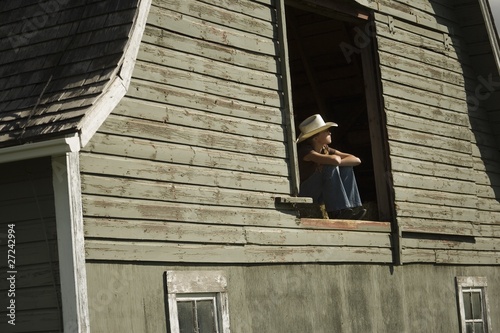 Photo: Young Woman In Barn Loft Young Woman In Barn Loft