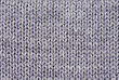 Close-up of knitted wool texture/ Gray Close-up of knitted wool texture/ Gray