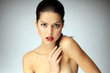 Photo: Close-up of beautiful young woman posing. Close-up of beautiful young woman posing.