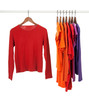 Red and purple shirts on wooden hangers Red and purple shirts on wooden hangers