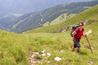 Woman hiking up a mountain