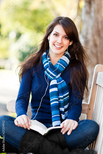Photo: Mixed race college student studying Mixed race college student studying
