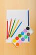 Art concept with painters palette and paint brush