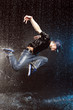 Hip-hop dancer in aqua studio