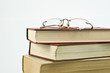 Glasses on books