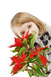 Pretty little girl with red poinsettia Pretty little girl with red poinsettia