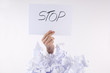 Businessman overwhelmed by the paper