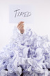 Businessman overwhelmed by the paper