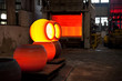 Hot forged steel balls In a forge environment.