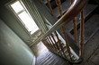 Photo: Looking down at an old wooden stairs at an abandoned building Looking down at an old wooden stairs at an abandoned building