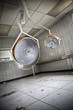 Photo: The surgical lamps of a surgery room at an abandoned hospital. The surgical lamps of a surgery room at an abandoned hospital.