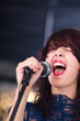 Beautiful rock singer with microphone