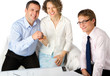 Happy couple buying new home with real estate agent