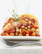 Chickpeas cooked with diced bacon and peppers