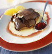 fudge tartlet with orange sauce