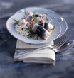 Rollmops with cream,dill and pink peppercorns