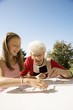 Grandmother And Granddaughter Playing A Game