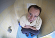 after a sleepless night with diarrhea - man sitting on toilette