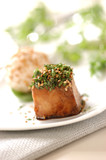 Photo: cube of caramelized grouper fish with soya and honey, topped with herbs and sesame seeds cube of caramelized grouper fish with soya and honey, topped with herbs and sesame seeds