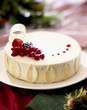 Coconut and summer fruit iced cake