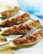 courgette stuffed with raw ham and mushrooms