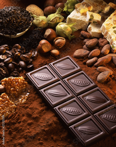 Photo: Chocolate bar,nougatand a selection of nuts Chocolate bar,nougatand a selection of nuts