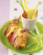 rabbit leg larded with bacon and cheese