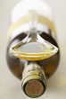 Bottle and spoon of olive oil