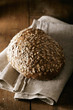 Oat bread loaf on a tea towel