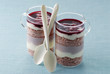 Small glass cups of pink dessert trifle-style