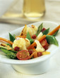 Mixed summer vegetables with ham